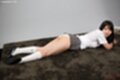 Iori sana lying on her front in uniform skirt raised over panties